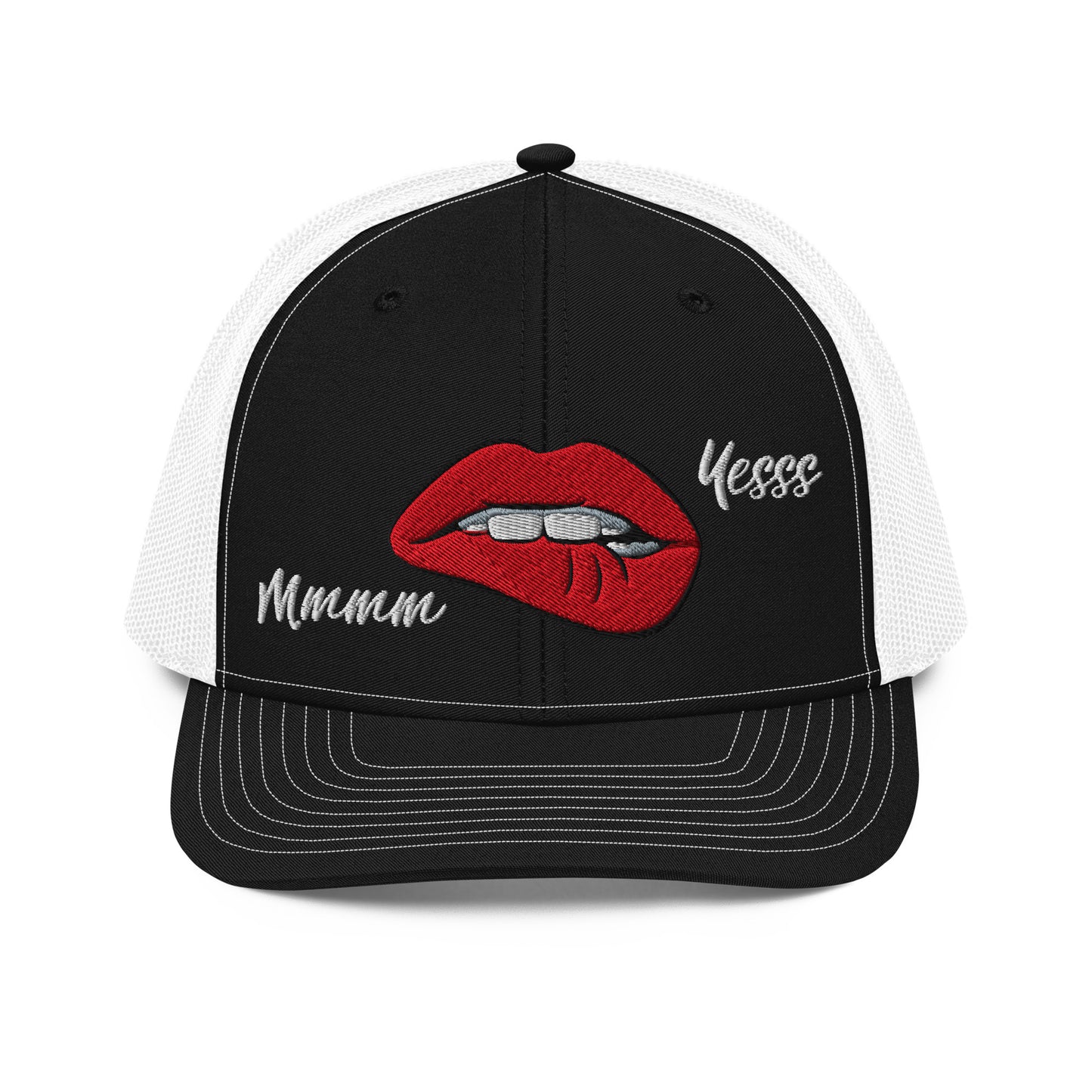 Black and white trucker cap with embroidered sexy red lips and 'Mmmm' and 'Yesss' captions, featuring a structured fit and breathable mesh back.