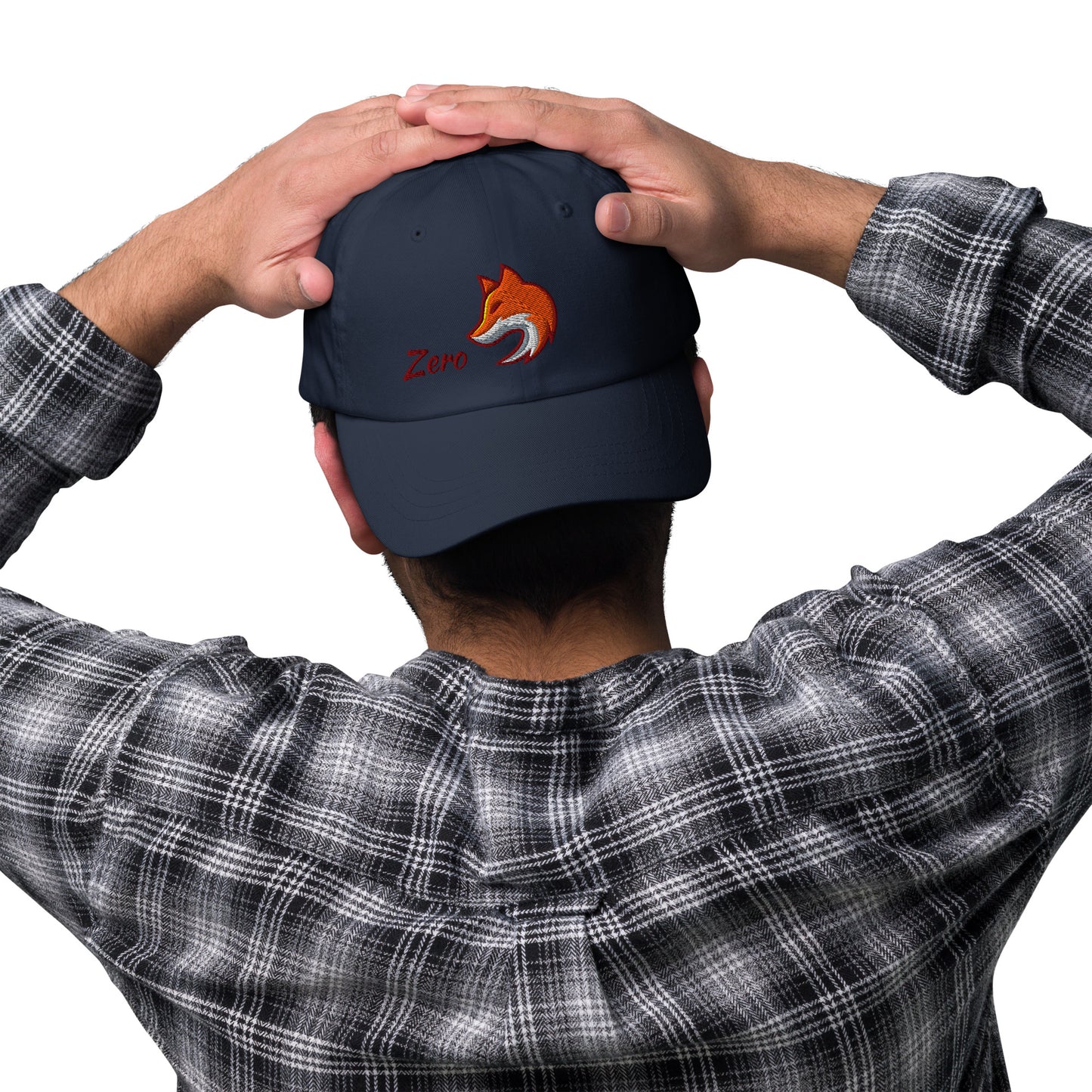 Man wearing navy blue baseball cap with embroidered fox and the word "Zero" on the front, suggesting the phrase "Zero Fox" or "Zero Fcks."