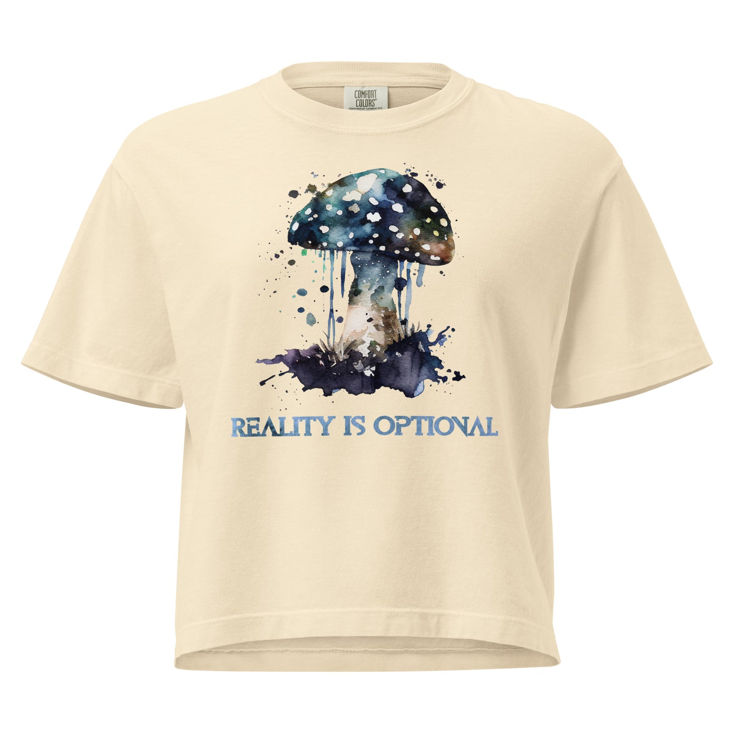 Yellow mushroom t-shirt with psychedelic watercolor design and “Reality Is Optional” text.